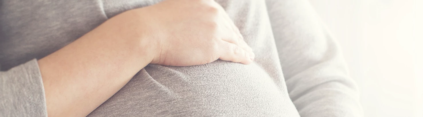 Baby lying on its back staring up at you